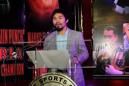 A MAN FOR OTHERS. Rep. Manny Pacquiao was given a 'Man for Others' award, and was the guest of honor and speaker. March 25, 2012. Hanz Lustre.