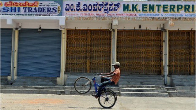Shops in India closed in protest at the entry of large foreign retailers. Photo by Man Junath Kiran/AFP/Getty images