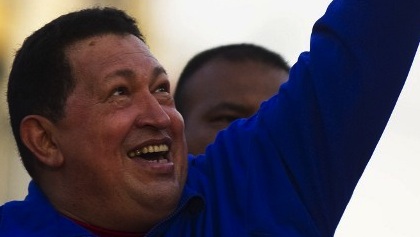 Venezuelan President Hugo Chavez greets supporters during a campaign rally in Monagas on September 28, 2012. AFP PHOTO/JUAN BARRETO