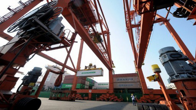 PORT BIZ. Razon-led International Container Terminal Services Incorporated (ICTSI) expands thru new acquisitions. This photo, taken in 2011, shows cranes at the ICTSI port in Manila. Photo by AFP