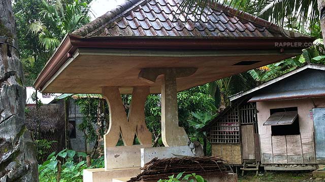 M and T. Waiting sheds along the national highway in Samar carry the initials of the Tan matriarch, Milagrosa. Photo by Judith Balea