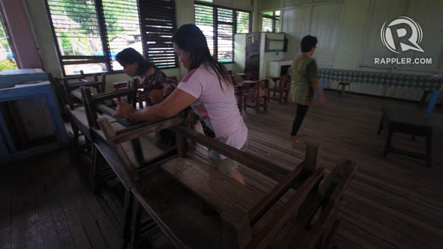 Teachers in Baganga Central Elementary School prepare for the May 13 elections. Photo by Karlos Manlupig