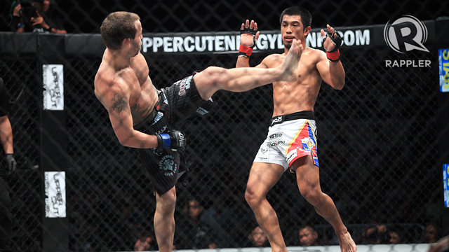 FILIPINO CHAMP. Pinoy Eric Kelly defeats USA's Jens Pulver by TKO at 1:42 minutes of Round 2.