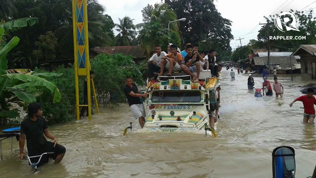 RARE FLOOD. Residents of Isabela City in Basilan. Photo by Richard Falcatan