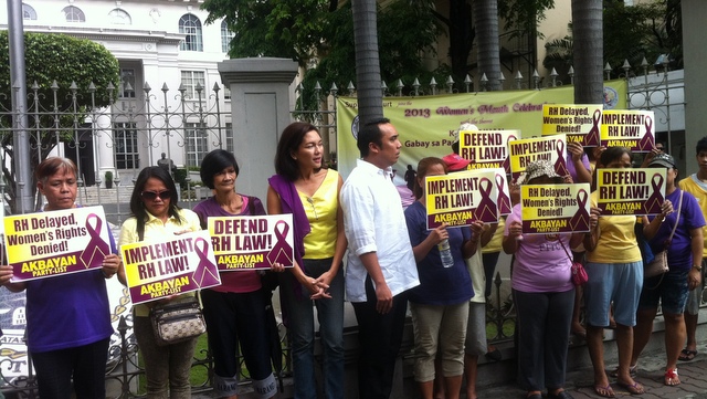 DON'T LET US WAIT. Risa Hontiveros (center) asks SC to lift status quo ante order on the RH law implementation.
