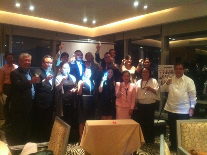 CHEERS. Ramon Jimenez raises his glass at the induction of IMMAP's executive officers and board of directors.