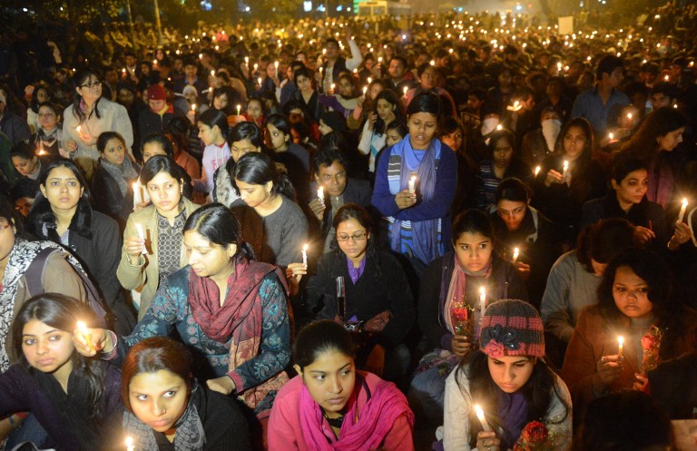 INDIA IN MOURNING. Indian protestors hold candles during a rally in New Delhi on December 29, 2012, after the death of a gang rape student from the Indian capital. AFP PHOTO/RAVEENDRAN