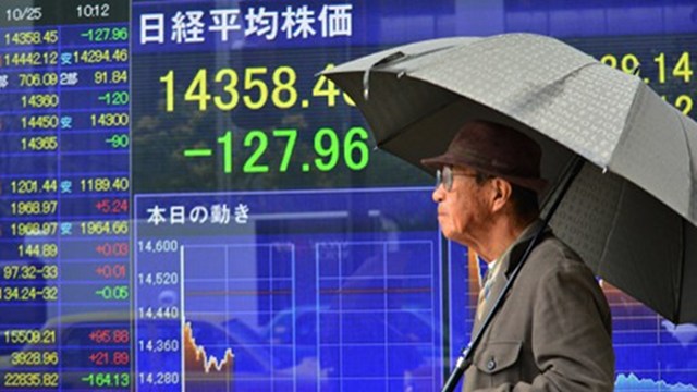 'ABENOMICS' WORKING? September prices did not fall in deflation-plagued Japan. Photo by AFP