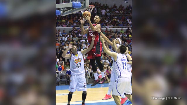 CLUTCH. Japeth Aguilar (in dark uniform) delivered big in the clutch for Ginebra in a heart-stopping win over Talk 'N Text. Photo by Nuki Sabio/PBA Images
