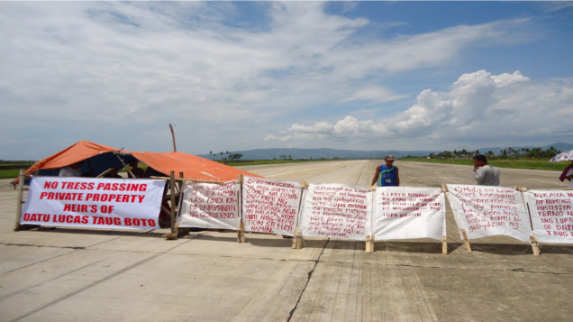 CAMP OUT. IPs barricaded the Pagadian City airport runway to demand for payment of their expropriated land. Photo by Jong Cadion
