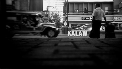 A sailor waits along Kalaw street. Photo by Patricia Evangelista.