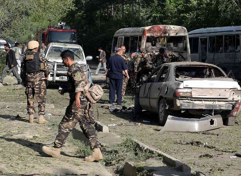 SUICIDE ATTACK. Afghan personel arrive at the site of a suicide attack in Kabul, which killed 14 and wounded 38 others. Photo by AFP/Daud Yardost