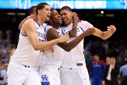 KINGS OF THE COURT. Eloy Vargas #30, Darius Miller #1, Anthony Davis #23 and Twany Beckham #10 of the Kentucky Wildcats celebrate defeating the Kansas Jayhawks 67-59 in the National Championship Game of the 2012 NCAA Division I Men's Basketball Tournament at the Mercedes-Benz Superdome on April 2, 2012 in New Orleans, Louisiana. Jeff Gross/Getty Images/AFP 