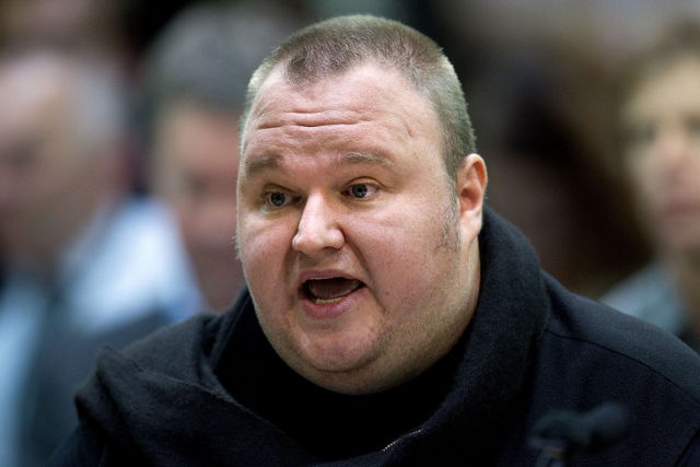KIM DOTCOM SPEAKS. Megaupload founder Kim Dotcom speaks as he comes face to face for the first time with New Zealand Prime Minister John Key as lawmakers examine a controversial proposal allowing intelligence agencies to spy on local residents at Bowen House in Wellington on July 03, 2013. AFP PHOTO / MARTY MELVILLE