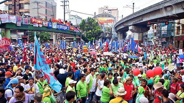 NAGKAISA. Thousands of Filipino workers hold Labor Day protests in Manila. Photo by Rappler/Ace Tamayo