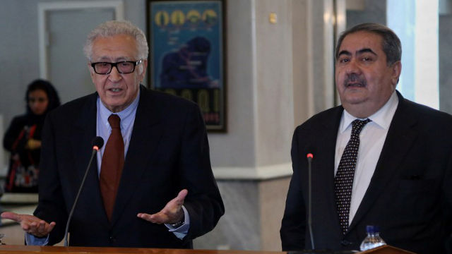 PARTICIPATION. Lakhdar Brahimi (L) at a press conference with Iraqi Foreign Minister Hoshyar Zebari in Baghdad, October 21, 2013. AFP PHOTO / POOL / KHALID MOHAMMED