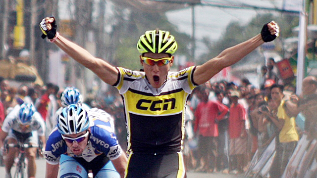 QUICK START. Ki Suk Lee of CCN Celebrates as he crosses the finish line of the first stage of the Le Tour De Filipinas 2013 in Cagayan. Photo by Rappler/Kevin dela Cruz.