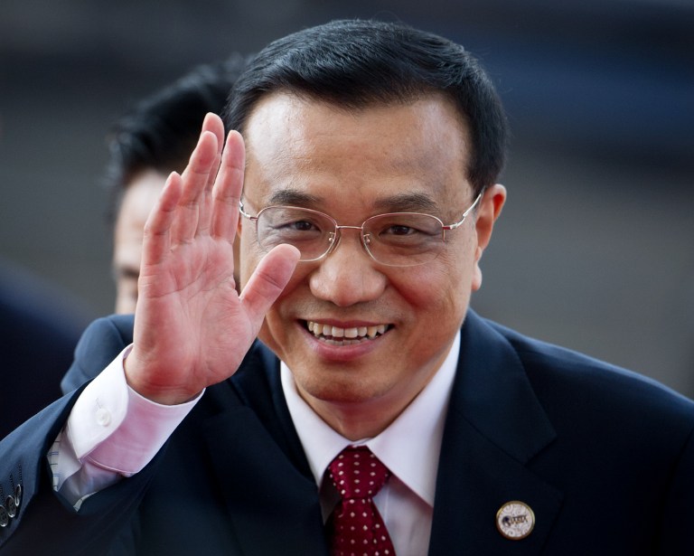 NEW PREMIER. In a file picture taken on April 2, 2012, China's Vice Premier Li Keqiang waves as he arrives for the opening ceremony of the Boao Forum for Asia on the southern Chinese island of Hainan. AFP PHOTO / POOL / Ed Jones / FILES