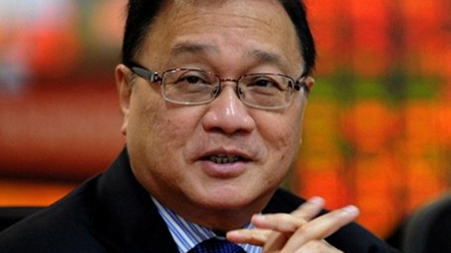 FEELERS? Vice President Jejomar Binay admits he's considering businessman Manuel V. Pangilinan as his running mate in 2016. Photo by AFP