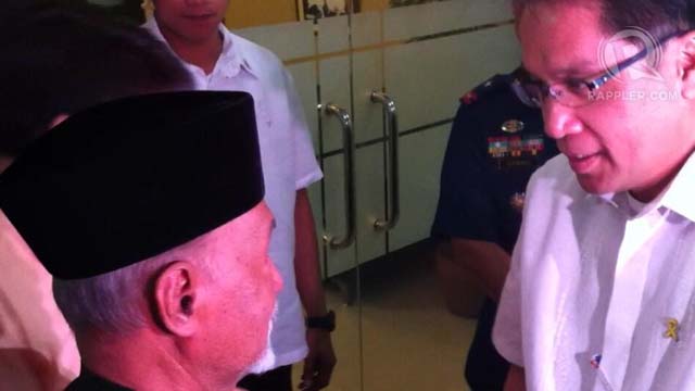 TALKS. The brother Sultan Jamalul Kiram III visits Interior Secretary Mar Roxas in Camp Crame. Photo by Ayee Macaraig