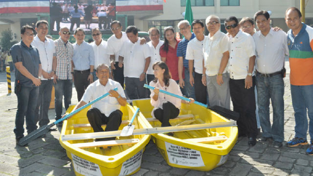 READY TO RESCUE. Marikina city officials pose with the new rescue boats donated by Ortigas & Co. The new equipment is part of the city's intensified disaster response program. Photo from GreenBulb.