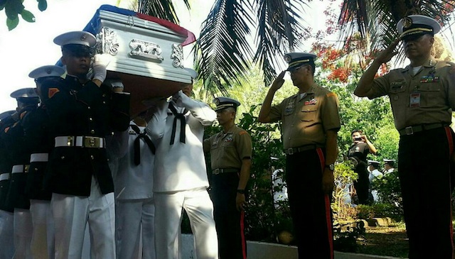 FALLEN COMRADE: Philippine Marines honor comrades slain in Sulu  as the remains arrive in Manila