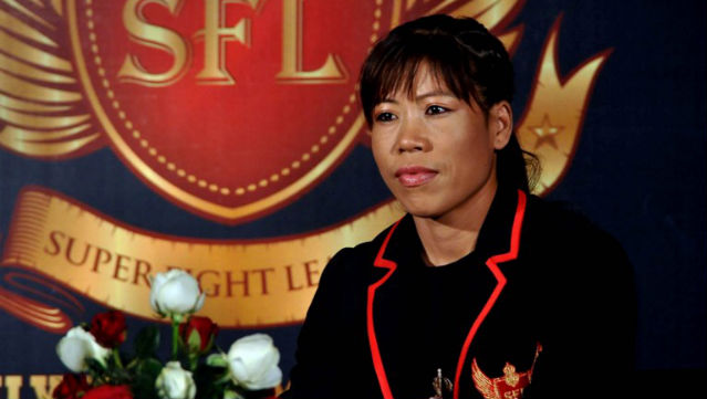 CHAMPION. Indian Olympic Female Boxing Bronze Medallist Mary Kom is introduced as the Super Fight League's (SFL) brand ambassador during a press conference in Mumbai in 2012. AFP PHOTO