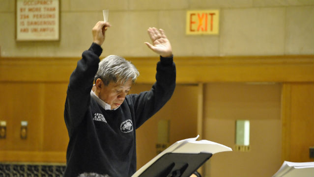 MAESTRO. Dadap leads the orchestra during rehearsals