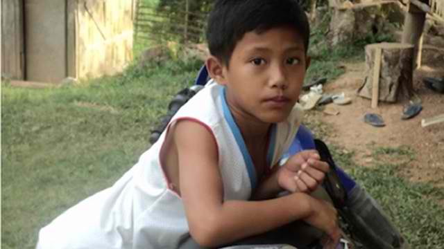 FALLEN SON. Jordan Manda, 11-year-old son of a tribal chieftain in Zamboanga del Sur. Photo by Vicky Cajandig