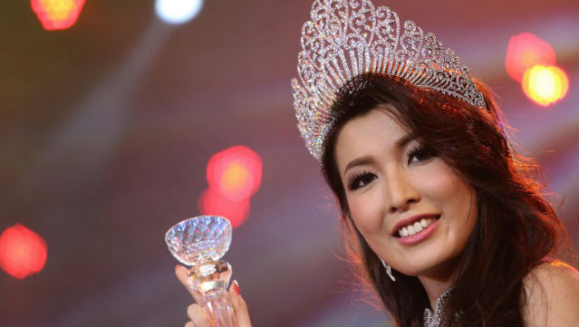 MS. MYANMAR. 25-year-old Moe Set Wine holding her trophy as the first Ms. Universe contestant in 50 years