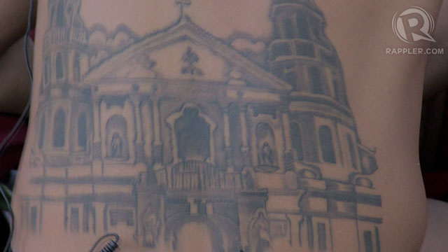 DEVOTION. A Nazareno devotee shows off one of his many tattoos-- this one of the Quiapo Church, the home of the image of the Black Nazarene.