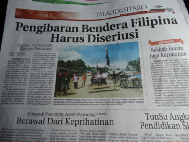 PHILIPPINE FLAG. Photo of the news item in Manado Post (16 December 2013), the article says ‘Raising of the Philippine flag has to be taken seriously’. 