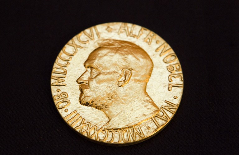 This picture taken on December 10, 2010 shows the front of the Nobel medal awarded to the Nobel Peace Prize laureate for 2010, jailed Chinese dissident Liu Xiabo. AFP PHOTO / SCANPIX - Berit Roald