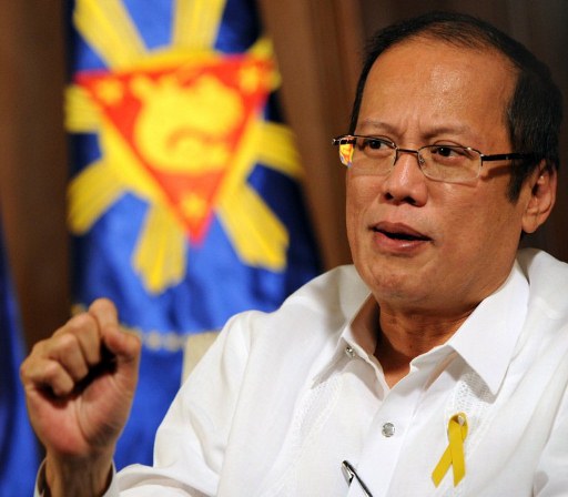 ON THE RIGHT TRACK. After 21 months in the office, President Aquino says the Philippine economy is on the right track. Photo by AFP