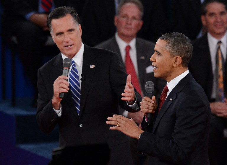 US President Barack Obama and Republican Presidential candidate Mitt Romney participate in the second presidential debate at Hofstra University in Hempstead, New York, on October 16, 2012. Obama and Romney face off in a town-hall style debate with undecided voters asking questions of the two candidates. AFP PHOTO/Emmanuel DUNAND