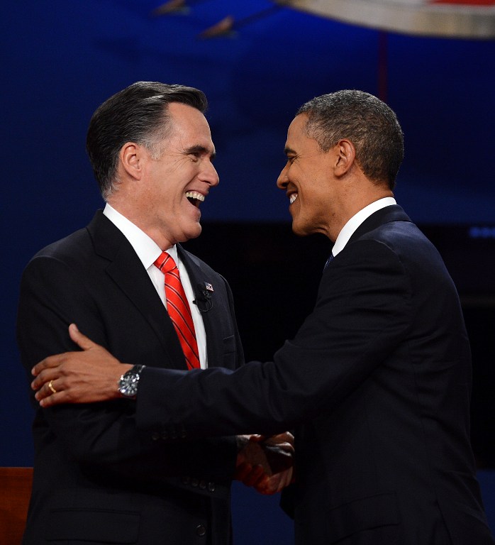 US President Barack Obama (R) shakes hands with Republican presidential candidate Mitt Romney on October 3, 2012 in Denver, Colorado, at the start of the first of three presidential debates. AFP PHOTO/SAUL LOEB