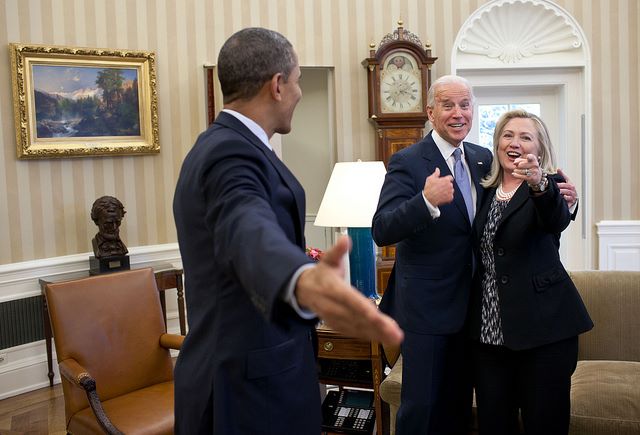 OOPS. Just what was happening? Photographer Pete Souza fills us in: "This is one of those rare instances where my presence indirectly became a part of this reaction from those pictured in the photograph. Secretary of State Hillary Clinton had just accidentally dropped all of her briefing papers onto the Oval Office rug and she, the President and Vice President all reacted in a way that indicated that surely I wouldn't get a photo of that to embarrass her." Photo from the Barack Obama Flickr stream. 
