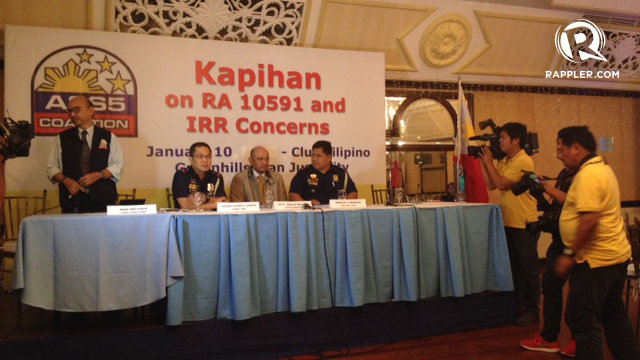 AMEND, REPEAL. Heads of the PNP Civil Security Group and Firearms and Explosive Office face gun owners during a forum. Photo by Rappler