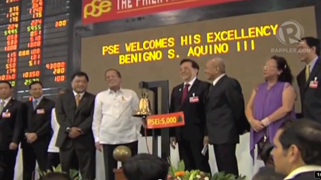 RINGING IN SUCCESS. President Aquino rings the opening bell at the PSE on March 6, 2012.