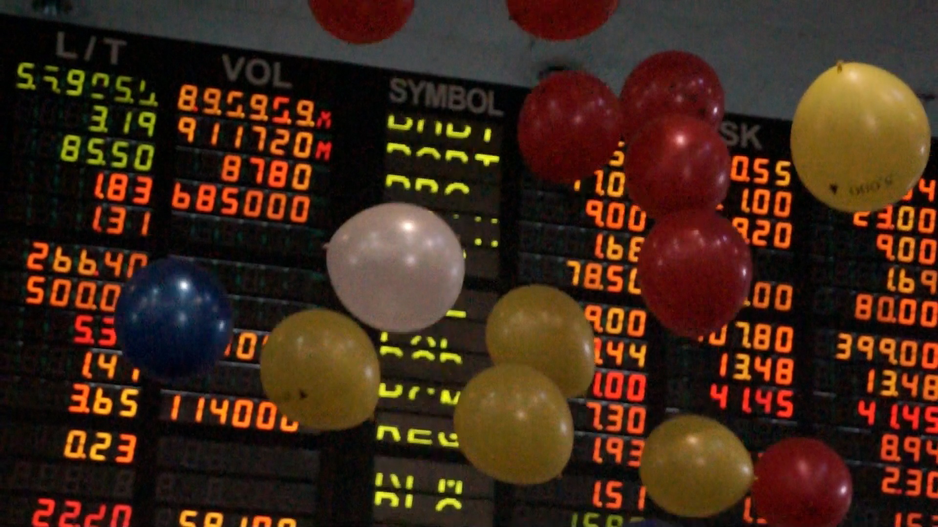 CELEBRATING AQUINOMICS. Balloons are released after President Aquino opens trading on March 6, 2012.