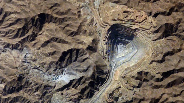 This NASA image released 13 October, 2003 captured by the crew on board the International Space Station looks down the bull's-eye of a copper mine in Peru. AFP PHOTO/NASA