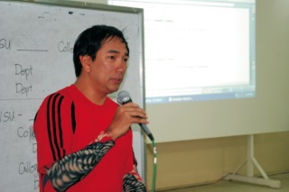 Petilla, still wearing his wetsuit, addresses academics at Visayas State University. Photo by Jed Asaph Cortes