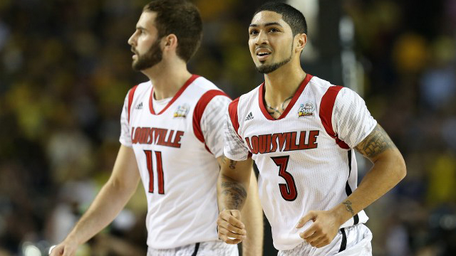 RISING TO THE CHALLENGE. Siva (right) and Hancock keyed the Cards' comeback. Photo by Streeter Lecka/AFP.