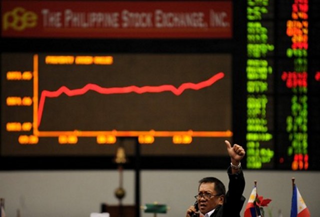 GOING UP. The main index of the Philippine Stock Exchange still breaking records. Photo by AFP