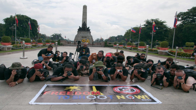 PLANKING PROTEST. Photographers call for freedom to take pictures in public places. Photo by Roy Lagarde