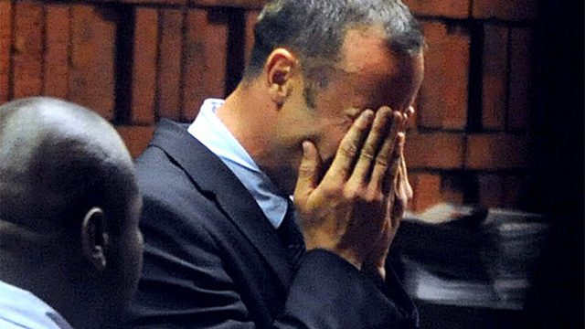 THE BULLET. South Africa's Olympic sprinter Oscar Pistorius buries his face in his hands during his hearing back in February. He is charged with the murder of his model girlfriend Reeva Steenkamp. AFP PHOTO/ Antoine de Ras