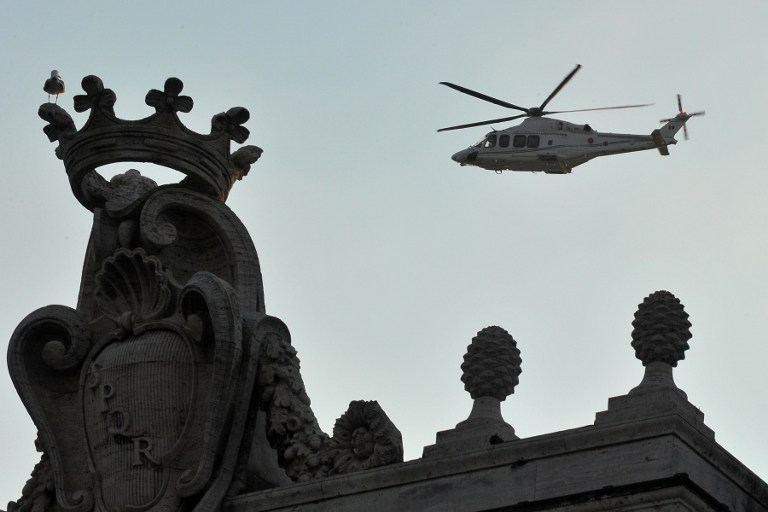 LEAVING VATICAN. A helicopter brings Pope Benedict XVI to his retirement home. Photo from AFP