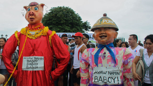 PIG HEADED. A 'higante' with a pig's head gains the attention of protestors at the August 26 #MiliionPeopleMarch in Luneta. All photos contributed by Bopeep Espiritu