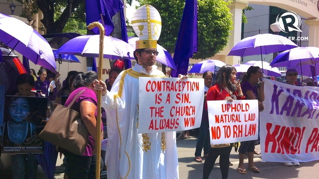A LOUD NO. Catholic groups hold a rally in front of the Supreme Court. Photo by Ace Tamayo/Rappler