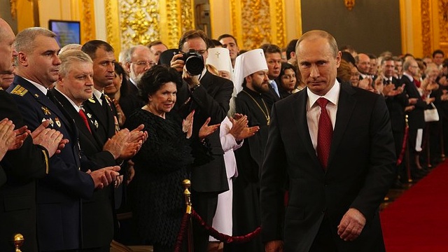 Russian President Vladimir Putin walks past guests during his inauguration at The Kremlin in Moscow, May 7, 2012. Photo courtesy of the official website of the Russian presidency.